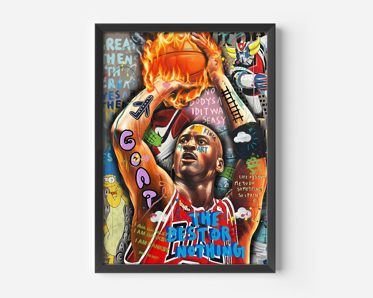 A framed, mixed-media, graffiti-style portrait of Michael Jordan in a red Chicago Bulls jersey mid-shot, with a flaming basketball held over his head. His arms are heavily tattooed with bright graffiti, including the word "GOAT." The artwork is a dense collage of colorful street art, featuring text like "THE BEST OR NOTHING" and various cartoon characters (like a character resembling Homer Simpson) and pop culture icons in the background. The overall style is vibrant, intense, and urban.
