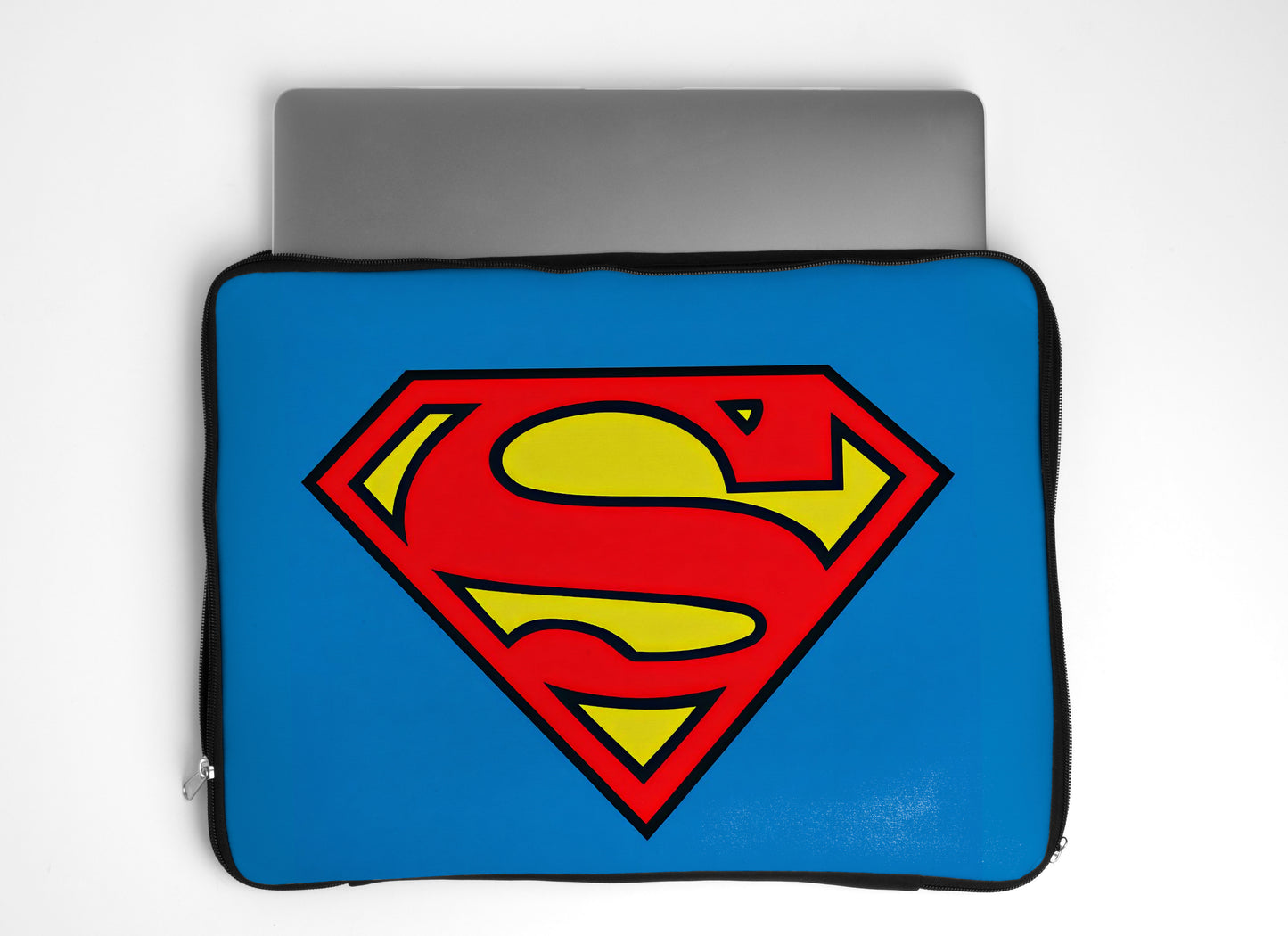 Dank N Drip Superman laptop sleeve featuring the iconic red and yellow “S” logo, bold design with durable protection for your device.