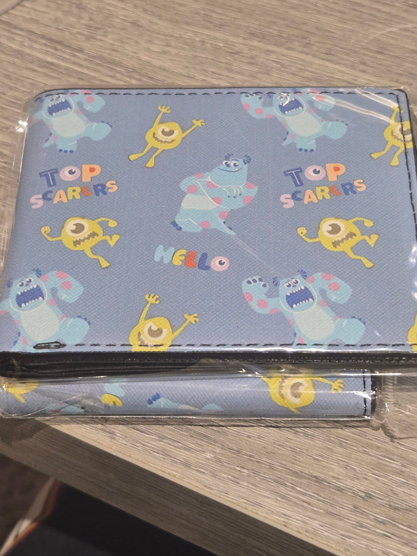 Monsters, Inc. Top Scarers Hello Pattern wallet