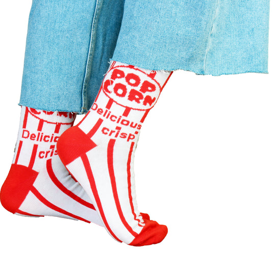 Dank N Drip Popcorn socks in white and red with a fun cinema popcorn box design, perfect for streetwear and movie lovers.